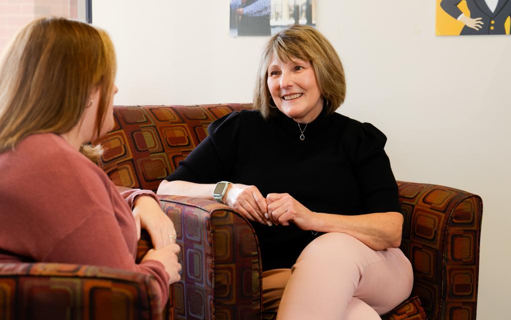 Two people in a counseling session